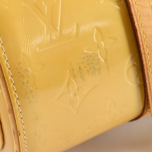Louis Vuitton Bedford Papillon
Handbag in Monogram Mango Vernis - Picture 9 of 10